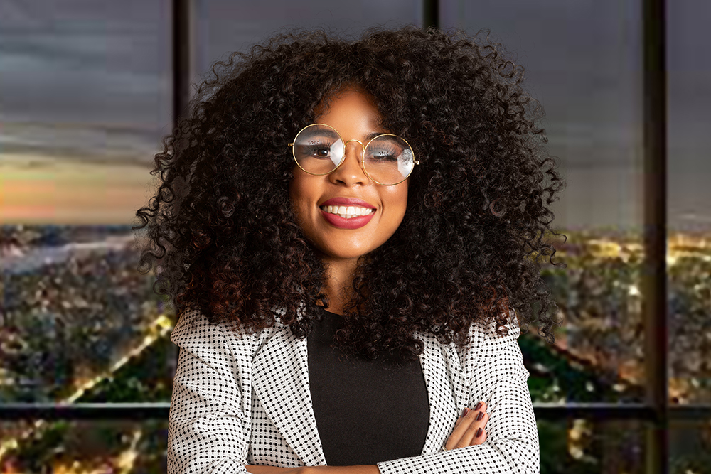 Business black woman on a yellow background